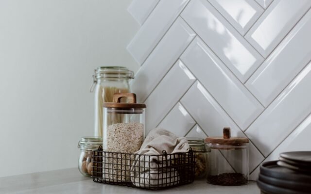Organized small kitchen storage containers and drawer dividers