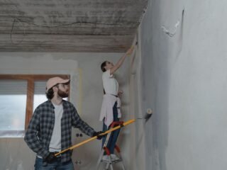 Homeowner using basic tools for a small home repair