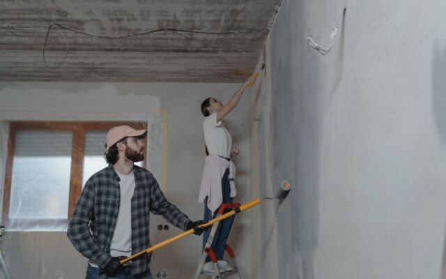 Homeowner using basic tools for a small home repair