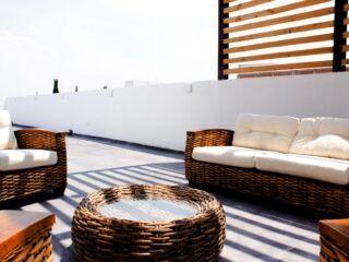 Comfortable outdoor patio seating area with string lights