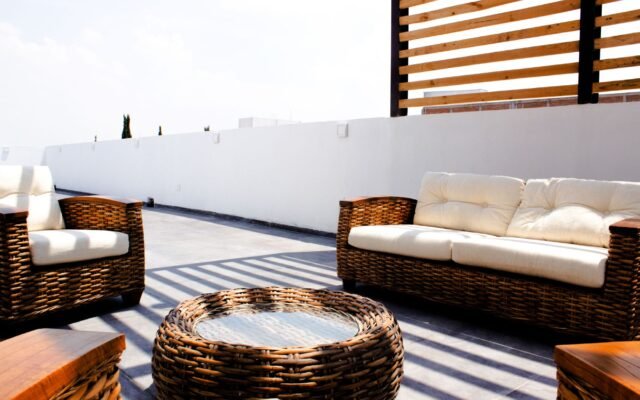 Comfortable outdoor patio seating area with string lights
