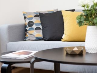 Personalized rental apartment interior with textiles and decor