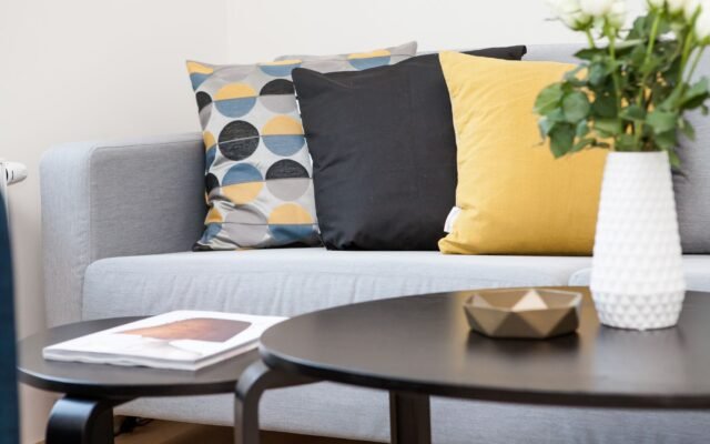 Personalized rental apartment interior with textiles and decor