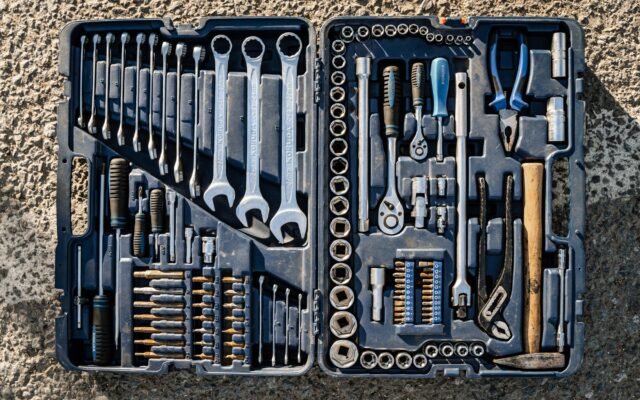 Basic hand tools laid out in a toolbox