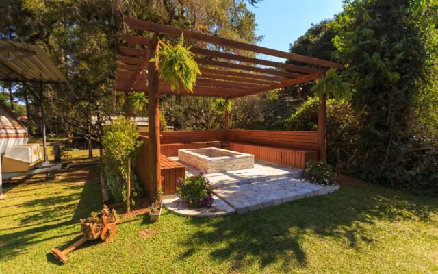 Well maintained backyard garden with layered planting beds