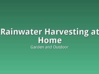 A residential rainwater collection tank connected to a home gutter downspout system